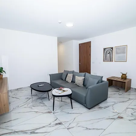 Апартаменты Modern 2-bedroom With Terrace - By Hostmt